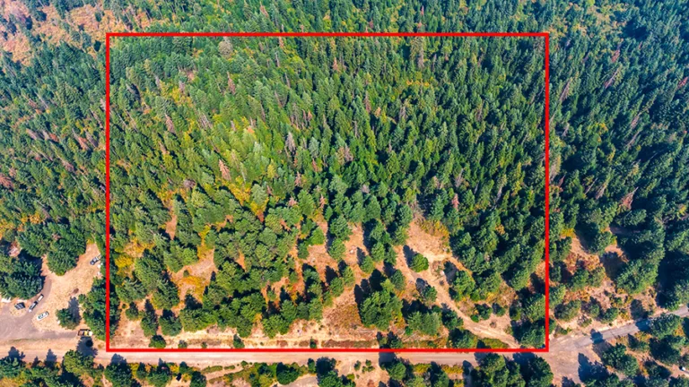 Wooded 10-acre property for sale on Aurora Lane in Worley, Idaho